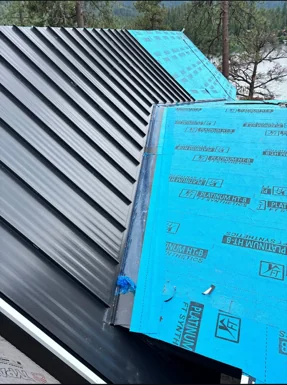 Metal roofing installation in progress by DG Contracting